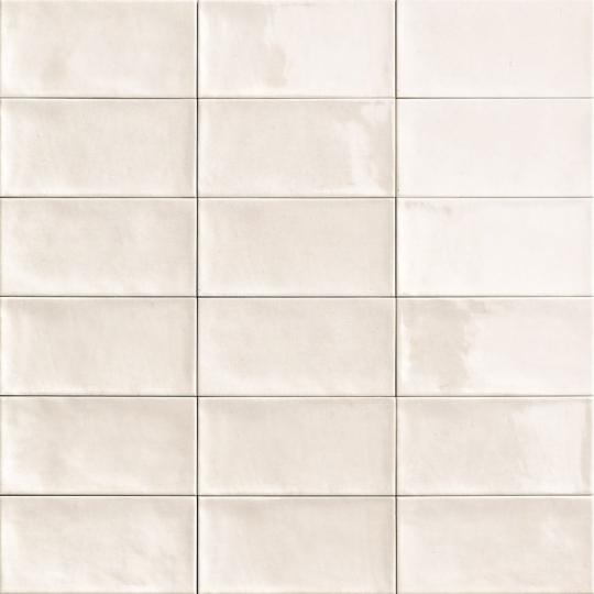 mediteransky maly romanticky biely kuchynsky obklad 10x20cm podlhovasty kupelnovy obklad klasicky budapest obkladacka vlnovy.jpg